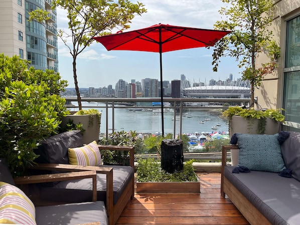Patio off the dining room with water feature and gorgeous view of False Creek.