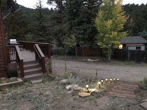 Lighted stairs form lower driveway