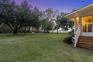 Expansive backyard with private boat landing and bulkhead to tie up your boat.