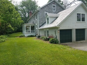 Back of home showing porch