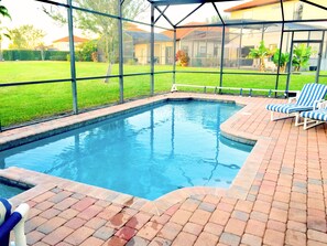 Big screened-in private pool/Spa with nice view