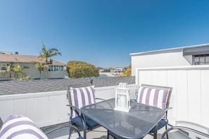 For morning coffee and sunset cookouts, the deck is the perfect spot to enjoy the bayside breezes.
                