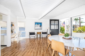 Guests are greeted by a Dutch door to catch the gentle breezes off the bay, and will love the crisp white bead board and planking throughout this 1 bedroom home.
                