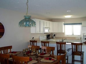 Dining table for 6 plus 4 bar stools at kitchen counter 