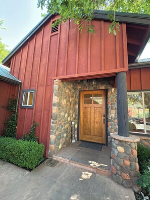 Welcome! Main entry off the circular driveway and covered carport. 