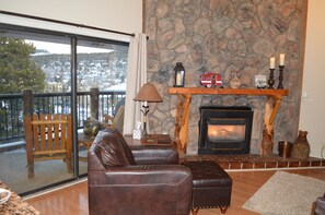 Living room gas fireplace. Private balcony with view of town and Baldy Mountain.