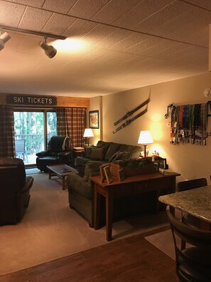 Family room view and outdoor ground level deck