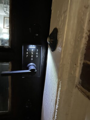 Building Door KeyPad accessible with Code provided by Owner 