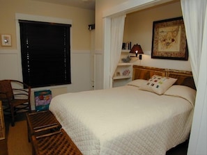 Master bedroom with built in side tables.