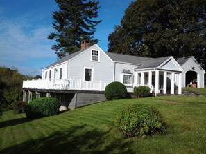 Our Cape house is on one level, overlooking the harbor, with a screened porch
