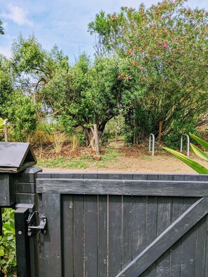 Front gate straight to your own 20m path through the vegetation to beach