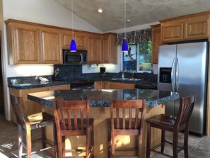 Bright and well-provisioned kitchen, with room for multiple chefs to share!