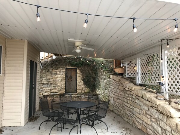 Down stairs covered seating area.