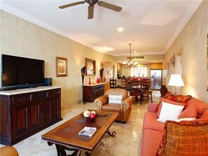 Living Room with plenty of seating to relax and watch TV