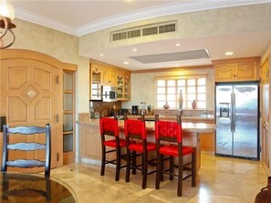 Kitchen with granite and stainless steel appliances