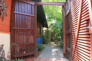 Gate open onto front patio