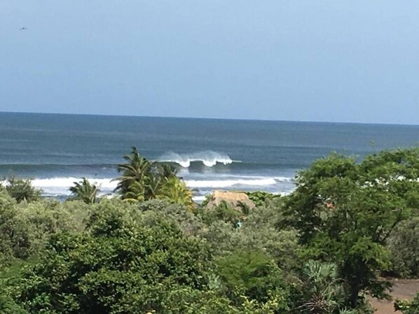 Surf view from living room and deck. 