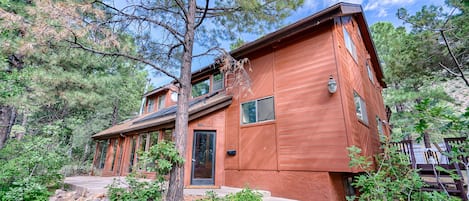 Nestled on an acre wooded lot in the heart of Flagstaff on the National Forest