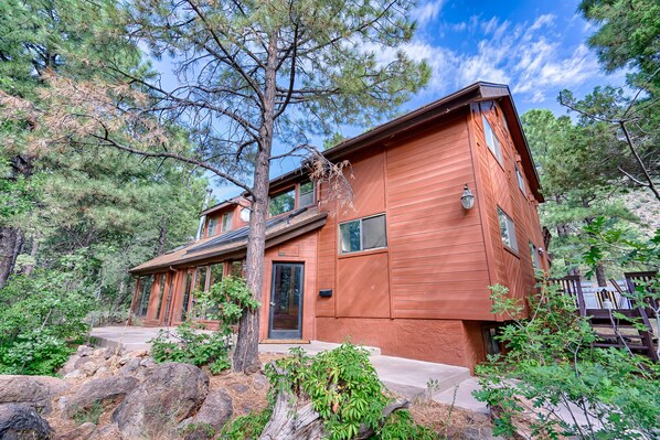 Nestled on an acre wooded lot in the heart of Flagstaff on the National Forest
