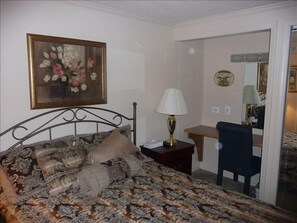 Bedroom with vanity area