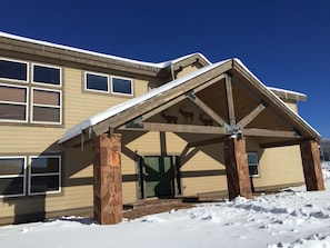 The front of the house has locally made  elk sculptures above the main entry.