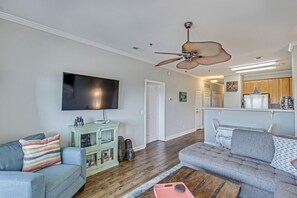 The sectional sofa provides plenty of room to watch the large HDTV...