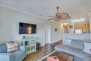 The sectional sofa provides plenty of room to watch the large HDTV...