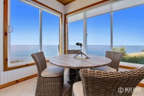 Unobstructed views of Lake Michigan waters from the four seasons room