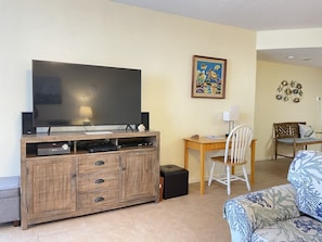 Samsung smart TV, desk and touch lamp; Games and activities under TV for all age