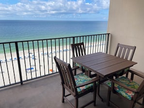 Polywood table and chairs with cushions. Side chair and lounge chair