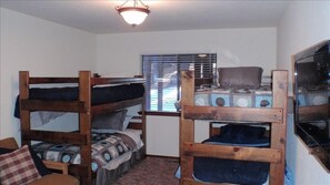 Bunk room sleeps 6 and has flat screen mounted on wall. Great kid hang out!