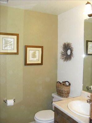 Half bath near kitchen and living room is a convenient bonus.