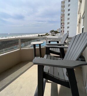 High top chairs and table for unobstructed beach and water views
