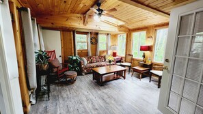 Sunroom for relaxing with a good book or glass of wine. 