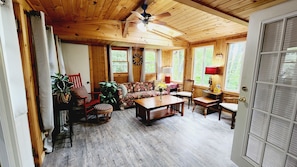 Sunroom for relaxing with a good book or glass of wine. 