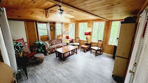 Sunroom with new floors January 2023. 