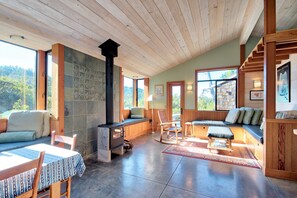 The open plan living area creates a warm and welcoming space. 