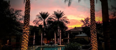 Resort pool area, BBQ grills, and hot tub