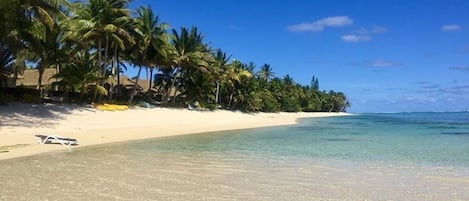 The stretch of beach right outside your villa