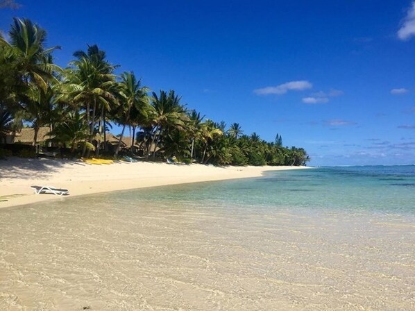 The stretch of beach right outside your villa