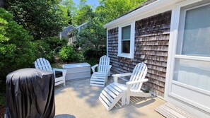 Relax on the patio with outdoor seating and gas grill