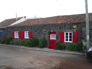 Beautiful stone cottage on a quiet street with a beautiful garden in the back