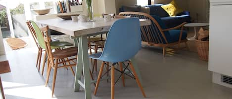 Open plan dining area from kitchen and into living room