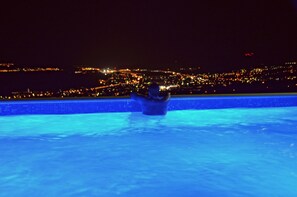 Panoramic night view from the pool