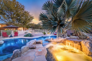 Immerse yourself in beauty, gaze from the spa and waterfalls across the pool to the charming cabin. A picturesque escape awaits. 🏞️🏊‍♂️🏡 #PoolsideSerenity