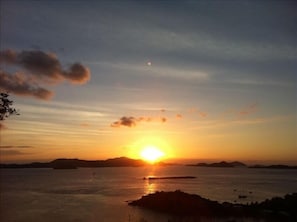 Sunset and views of St. Thomas from pool deck.