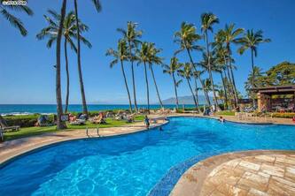 Beautiful Condo Steps to a Great Beach . Stunning Pool that is Ocean Front.