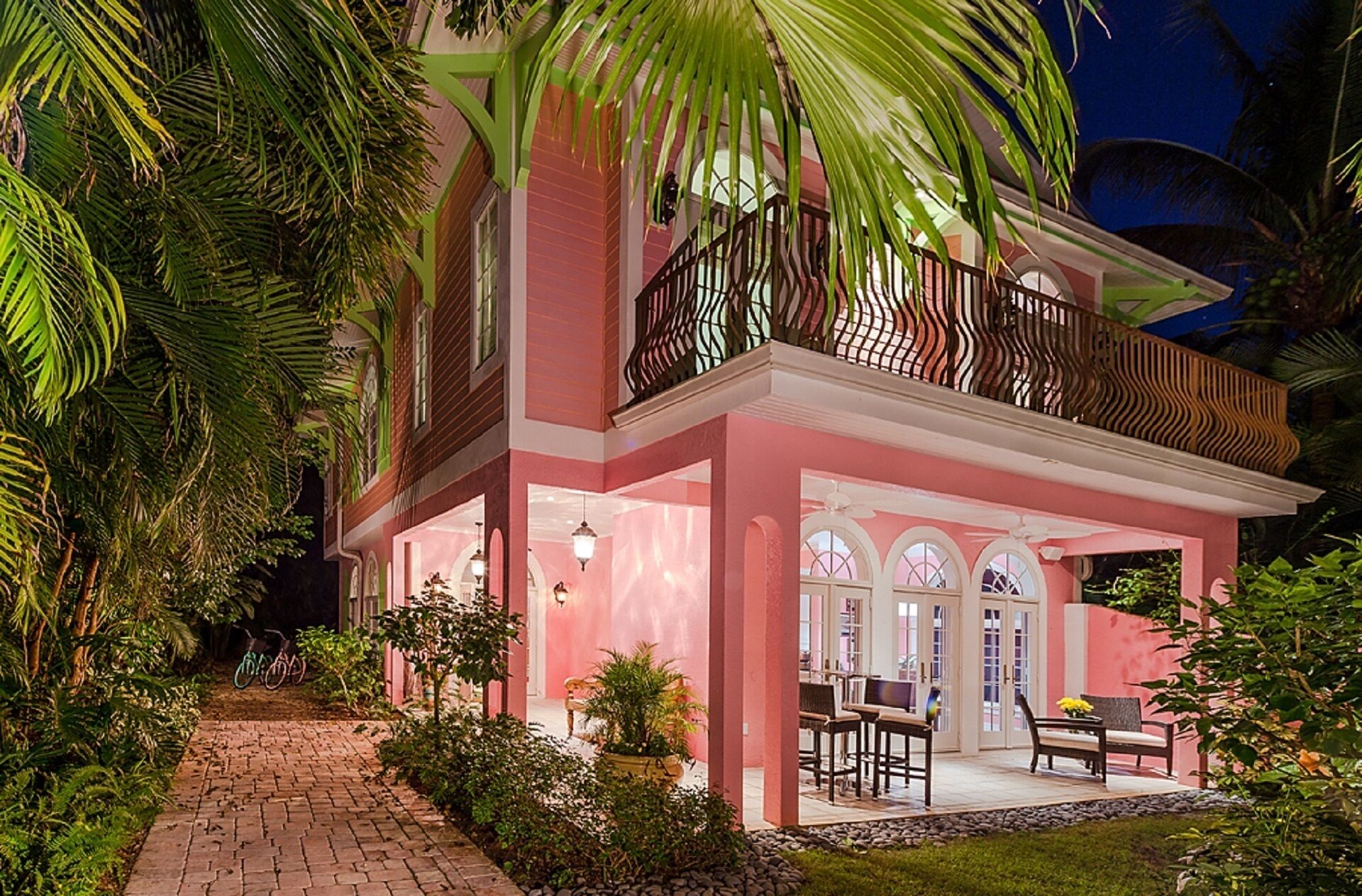 Waterfront Pink House with Private Dock & Pool! - Captiva | Vrbo