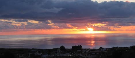 Spectacular sunset views from second-floor balcony