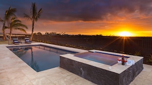 Soak in Hawaiian sunsets each day from the spa or pool
